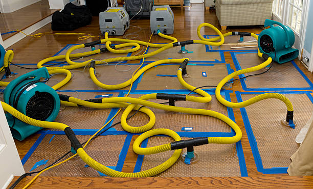 Professional Flood Damage Restoration technician working in Sterling, OK